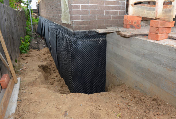 SJ Waterproofing Pros technician performing targeted Foundation Crack Repair assessment in Buckeystown, MD